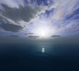 Fototapeta na wymiar beautiful sea sunset, light among the clouds above the water