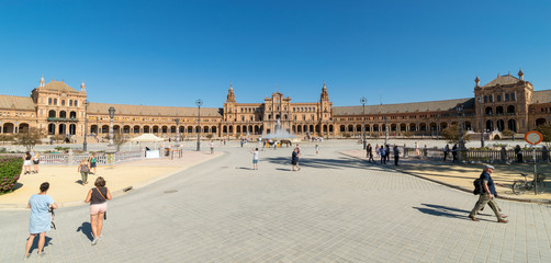 a shot of a busy summer day in Plaza De Espana in Seville, Spain 