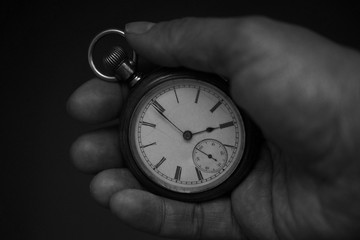 Pocket watch in hand