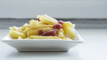 Fragrant french fries with tomato sauce