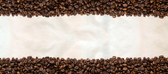 Coffee beans on paper background