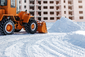 Snow cleaning process in winter in the city