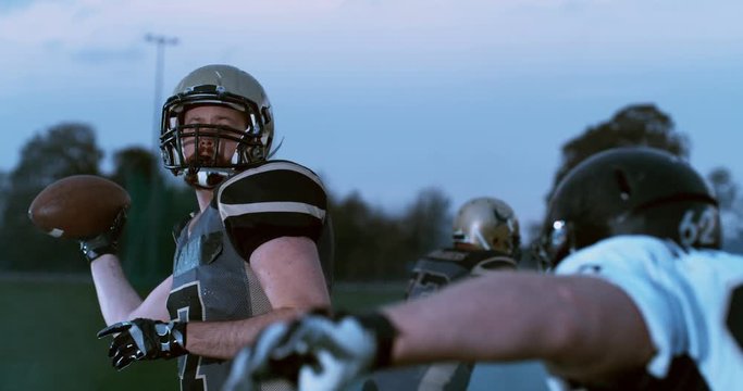 American football players in stadium during game