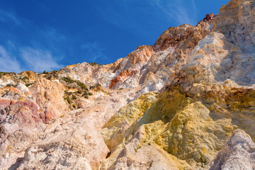 Obraz premium Multicolored rocks on Firiplaka Beach on Milos island. Cyclades, Greece