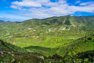 Panoramic mountain landscape with Pico del Teide peak in the distance, Tenerife; Canary Islands