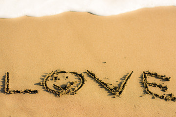 writing on the beach love