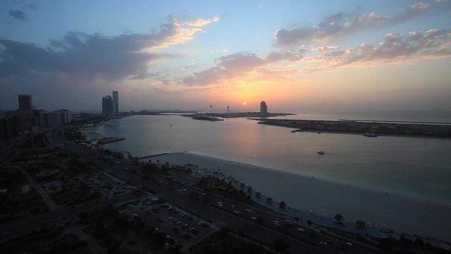 Abu Dhabi cityscape at sunset. Elevated view.