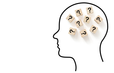 Human head drawing outline black color on white background with wooden block shape and question mark alphabet inside head, Thinking concept