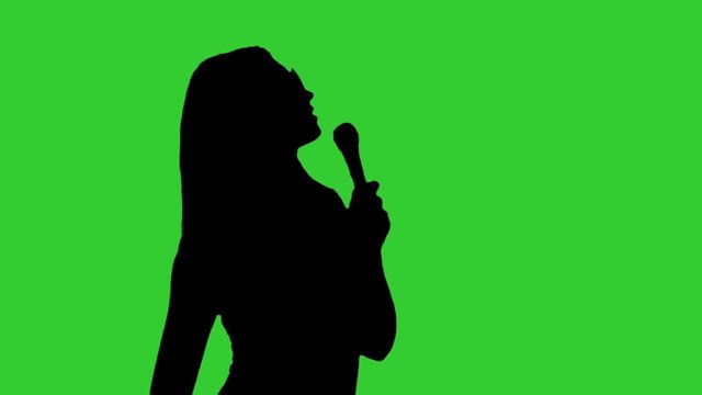 Silhouette of pretty dancing girl, isolated  