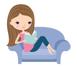 Young woman relaxing and reading a book on a cozy chair or sofa.