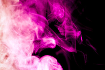 Colorful   pink smoke  on a black isolated background. Background from the smoke of vape