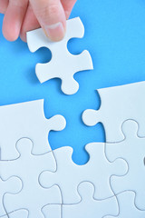 Jigsaw puzzle on a blue background



