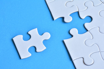 Jigsaw puzzle on a blue background


