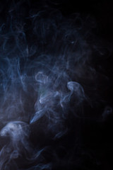 Smoke on a black background.