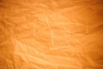 Brown crumpled paper background.
