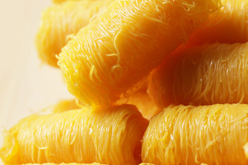 golden threads, sweet egg yolk fudge noodle cooked with syrup, Thai dessert stylist backgrounds
