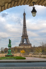 Fototapeta na wymiar Eiffel Tower from Bir-Hakeim metal bridge in the morning