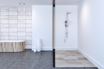 White tiled bathroom, shower and tub
