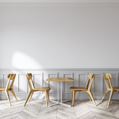 Café blanc moderne, chaises en bois