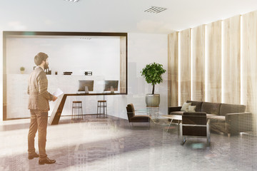 White and wooden office waiting room reception man