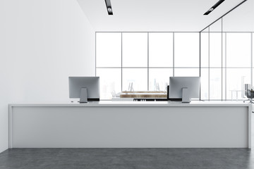 White reception desk in a panoramic office