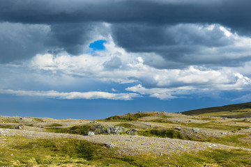 Dark clouds over the wilderness landscape