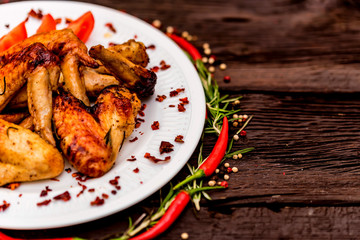 Chicken wings grilled with spices and chili pepper