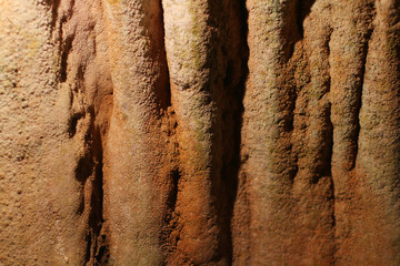 Stone texture of Cave with stalagmites and stalactites in the mountains