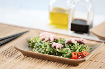 salad of sea cabbage chuka, octopus, soy sauce