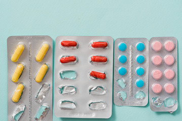 Full frame variation of medicine in blister packaging in pharmaceutical, medication concept background with multiple dosage form for cure or treatment human disease
