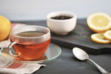 black Bayh tea with lemon in glass teapot