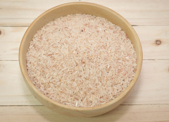  rice on the wooden background.