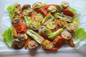 Delicious baked vegetables on parchment.