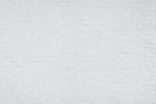 Backdrop of white brick wall texture.