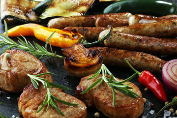 Assorted delicious grilled meat with vegetable on a barbecue