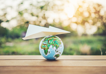 globe with paper plane,Travel concept.