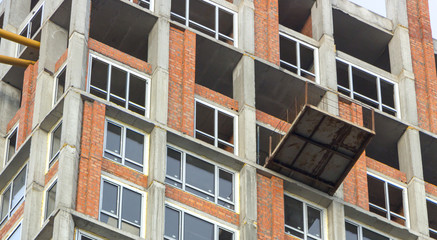 close up fragment of a house under construction without front wall