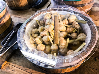 Wooden barrels with sauerkraut vegetables