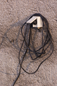 Outdoor socket with cable attached.