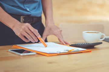Hand businessman working with documents at office