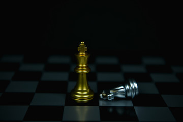 Leadership Concepts. Chess is a leader.  Comparing chess is a strategic business plan. Businessman is playing chess. Chess game on a black background.