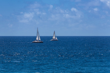 Two Sailboats on Blue