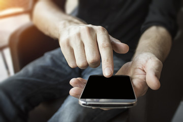 Mobile device in hands for business connected globally online through the internet.  Reliable fast data connection and network speeds.