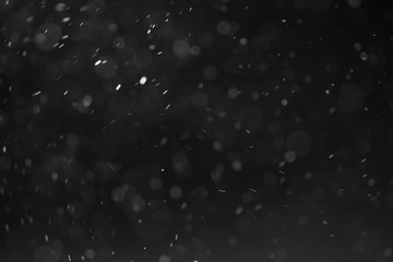 abstract dust particles over black background for overlay