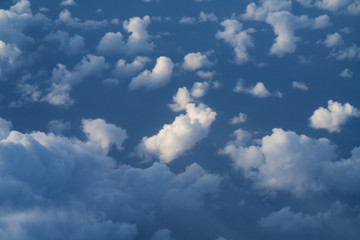 flying above the clouds in midday