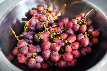 ripe grapes on the plate