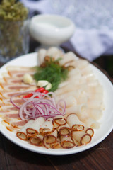 The food in the restaurant fish dish cutting of different types of fish and seafood