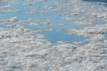 Spring ice drift on the river.