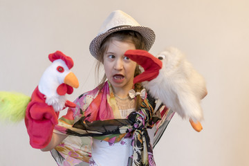 Happy child, creative fun concept - girl playing in the theater
