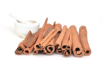 Cinnamon sticks putting on white background